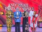 ELLY TOISUTA PENGHARGAAN